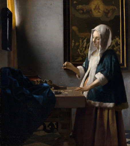 Woman Holding a Balance Poster | Johannes Vermeer Art Print (1664)